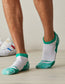 Man wearing Darn Tough Men's Sports Ankle Socks in Green